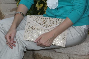 This is my new favorite clutch!  I love the cutout design and neutral color-with just the right amount of shine!  I got this clutch on Poshmark but you can buy similar here or here.