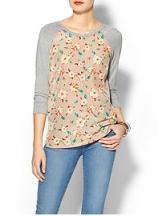 Floral patterns continue to be big this spring-love this casual but fun top!  $35